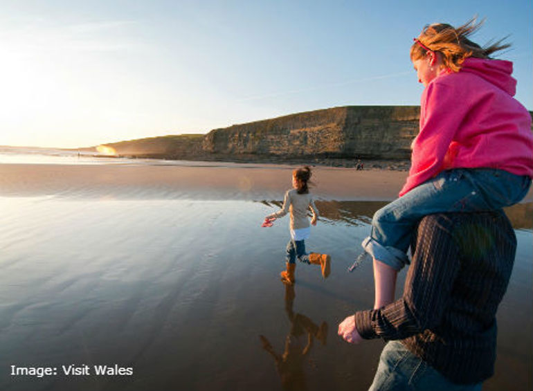 Family enjoying the beach. Image source: Visit Wales
