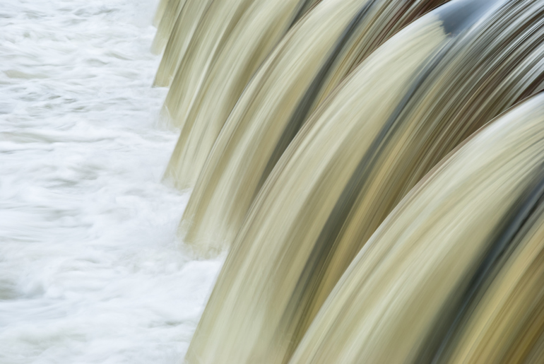 Water flowing over a weir