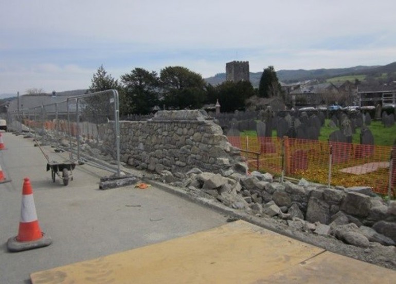 Repairing the stone wall in Dolgellau to improve the flood defences