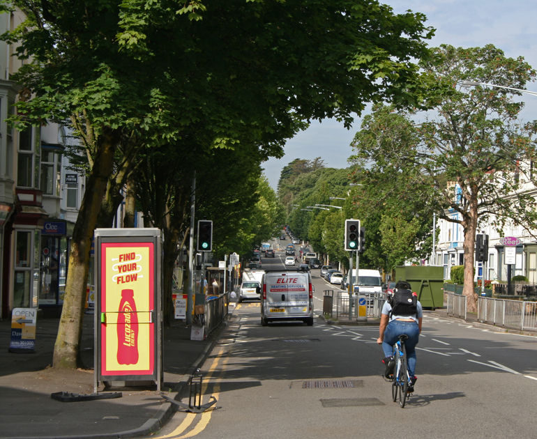 Street scene, trees, cyclist, traffic
