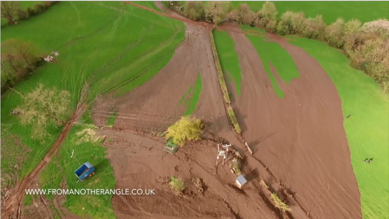 Image of slurry going downhill on a farm