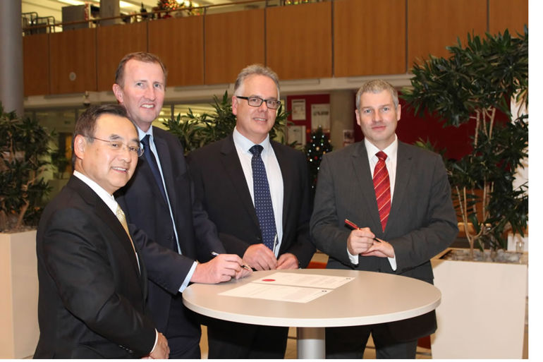 Image of Tim Jones (NRW), Mark Foy (ONR) and Dr Jo Nettleton (EA) approving the new nuclear power station design
